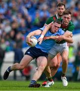 16 June 2024; Brian Fenton of Dublin is tackled by Donnacha McHugh of Mayo, resulting in a free to Mayo, during the GAA Football All-Ireland Senior Championship Round 3 match between Dublin and Mayo at Dr Hyde Park in Roscommon. Photo by Ray McManus/Sportsfile