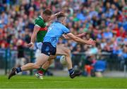 16 June 2024; Ryan O'Donoghue of Mayo has a shot on goal blocked by Brian Fenton of Dublin during the GAA Football All-Ireland Senior Championship Round 3 match between Dublin and Mayo at Dr Hyde Park in Roscommon. Photo by Ray McManus/Sportsfile