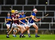 15 June 2024; Euan Murray of Tipperary in action against Gavin Maher of Galway during the Electric Ireland GAA Hurling All-Ireland Minor Hurling Championship semi-final match between Tipperary and Galway at TUS Gaelic Grounds in Limerick. Photo by Tom Beary/Sportsfile