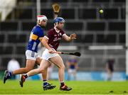 15 June 2024; Cathal Maloney of Galway in action against Euan Murray of Tipperary during the Electric Ireland GAA Hurling All-Ireland Minor Hurling Championship semi-final match between Tipperary and Galway at TUS Gaelic Grounds in Limerick. Photo by Tom Beary/Sportsfile