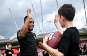 16 June 2024; Pittsburgh Steelers wide receiver Calvin Austin III and participant at the Pittsburgh Steelers Youth Camp which was held today at MTU Stadium in Cork. The event featured over 100 young American footballers across various age ranges in attendance, where they received real-time coaching and instruction from the Steelers and American Football Ireland. The Steelers hosted this event as initiative is part of the NFL’s Global Markets Programme, as the NFL team plans to expand their fanbase and grow the knowledge and love of American Football in both the Republic of Ireland and Northern Ireland. For further information and to see highlights of the event, visit Steelers Ireland social media accounts - @SteelersIreland. Photo by Seb Daly/Sportsfile