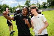 16 June 2024; Pittsburgh Steelers wide receiver Calvin Austin III and participants at the Pittsburgh Steelers Youth Camp which was held today at MTU Stadium in Cork. The event featured over 100 young American footballers across various age ranges in attendance, where they received real-time coaching and instruction from the Steelers and American Football Ireland. The Steelers hosted this event as initiative is part of the NFL’s Global Markets Programme, as the NFL team plans to expand their fanbase and grow the knowledge and love of American Football in both the Republic of Ireland and Northern Ireland. For further information and to see highlights of the event, visit Steelers Ireland social media accounts - @SteelersIreland. Photo by Seb Daly/Sportsfile