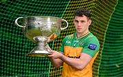 18 June 2024; Caolan McColgan of Donegal poses for a portrait with the Sam Maguire Cup during the launch of the GAA Football All-Ireland Senior Championship National 2024 at The Glen Centre in Maghera, Derry. Photo by Brendan Moran/Sportsfile