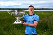 18 June 2024; Brian Howard of Dublin poses for a portrait with the Sam Maguire Cup during the launch of the GAA Football All-Ireland Senior Championship National 2024 at Lough Beg in Derry. Photo by Brendan Moran/Sportsfile