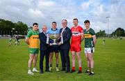 18 June 2024; In attendance at the launch of the GAA Football All-Ireland Senior Championship National 2024 at The Glen Centre in Maghera, Derry, are footballers from left, Caolan McColgan of Donegal, Brian Howard of Dublin, Emmett Bradley of Derry and Ruairi Murphy of Kerry with Uachtarán Chumann Lúthchleas Gael Jarlath Burns, Allianz corporate enterprise sales manager Feilimi Corr and the Sam Maguire Cup Photo by Brendan Moran/Sportsfile