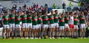 16 June 2024; The Mayo 'starting 15' stand for the playing of the National Anthem before the GAA Football All-Ireland Senior Championship Round 3 match between Dublin and Mayo at Dr Hyde Park in Roscommon. Photo by Ray McManus/Sportsfile