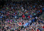 16 June 2024; A section of the 16,870 attendance, stand for the playing of the National Anthem, before the GAA Football All-Ireland Senior Championship Round 3 match between Dublin and Mayo at Dr Hyde Park in Roscommon. Photo by Ray McManus/Sportsfile