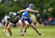 22 June 2024; Braden Dunlea of Midleton, Cork, in action against Jamie Egan of Oranmore Maree, Galway, during the John West Féile na nGael Camogie and Hurling Division One Finals at Hailo Tiles Wexford GAA Centre of Excellence in Ferns, Wexford.  Photo by Harry Murphy/Sportsfile