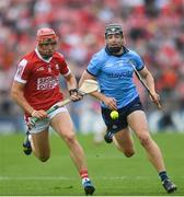 22 June 2024; Donal Burke of Dublin in action against Ciaran Joyce of Cork during the GAA Hurling All-Ireland Senior Championship quarter-final match between Dublin and Cork at FBD Semple Stadium in Thurles, Tipperary. Photo by John Sheridan/Sportsfile