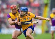 22 June 2024; Shane O'Donnell of Clare in action against Lee Chin of Wexford during the GAA Hurling All-Ireland Senior Championship quarter-final match between Clare and Wexford at FBD Semple Stadium in Thurles, Tipperary. Photo by John Sheridan/Sportsfile