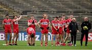 22 June 2024; Derry players and manager Mickey Harte, second from right, before the GAA Football All-Ireland Senior Championship preliminary quarter-final match between Mayo and Derry at Hastings Insurance MacHale Park in Castlebar, Mayo. Photo by Seb Daly/Sportsfile
