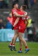22 June 2024; Derry players Conor Doherty, left, and Shane McGuigan celebrate after their side's victory in the GAA Football All-Ireland Senior Championship preliminary quarter-final match between Mayo and Derry at Hastings Insurance MacHale Park in Castlebar, Mayo. Photo by Seb Daly/Sportsfile