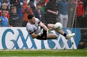 22 June 2024; Derry goalkeeper Odhran Lynch saves a penalty from Mayo's Ryan O'Donoghue during the penalty shootout of the GAA Football All-Ireland Senior Championship preliminary quarter-final match between Mayo and Derry at Hastings Insurance MacHale Park in Castlebar, Mayo. Photo by Seb Daly/Sportsfile