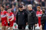 22 June 2024; Derry manager Mickey Harte, left, and Mayo manager Kevin McStay in conversation before the penalty shootout during the GAA Football All-Ireland Senior Championship preliminary quarter-final match between Mayo and Derry at Hastings Insurance MacHale Park in Castlebar, Mayo. Photo by Seb Daly/Sportsfile