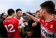 22 June 2024; Derry goalkeeper Odhran Lynch, second from left, celebrates with teammates Paul Cassidy, left, and Conor Doherty, right, after their side's victory in the GAA Football All-Ireland Senior Championship preliminary quarter-final match between Mayo and Derry at Hastings Insurance MacHale Park in Castlebar, Mayo. Photo by Seb Daly/Sportsfile