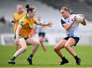 23 June 2024; Kellyann Hogan of Waterford in action against Roisin Rodgers of Donegal during the TG4 All-Ireland Ladies Football Senior Championship Round 3 match between Waterford and Donegal at Walsh Park in Waterford. Photo by Seb Daly/Sportsfile