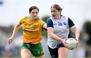 23 June 2024; Eve Power of Waterford in action against Susanne White of Donegal during the TG4 All-Ireland Ladies Football Senior Championship Round 3 match between Waterford and Donegal at Walsh Park in Waterford. Photo by Seb Daly/Sportsfile