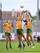 23 June 2024; Emma Murray of Waterford in action against Donegal players Caoimhe Keon, right, and Tara Hegarty, centre, during the TG4 All-Ireland Ladies Football Senior Championship Round 3 match between Waterford and Donegal at Walsh Park in Waterford. Photo by Seb Daly/Sportsfile