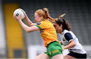 23 June 2024; Evelyn McGinley of Donegal in action against Hannah Power of Waterford during the TG4 All-Ireland Ladies Football Senior Championship Round 3 match between Waterford and Donegal at Walsh Park in Waterford. Photo by Seb Daly/Sportsfile