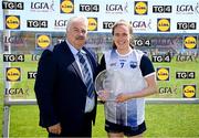 23 June 2024; Emma Murray of Waterford is presented with the Player of the Match award by LGFA vice president Robbie Smyth after the TG4 All-Ireland Ladies Football Senior Championship Round 3 match between Waterford and Donegal at Walsh Park in Waterford. Photo by Seb Daly/Sportsfile