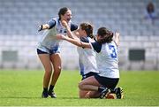 23 June 2024; Waterford players, from left, Niamh Power, Kate McGrath and Hannah Power celebrate after their side's victory in the TG4 All-Ireland Ladies Football Senior Championship Round 3 match between Waterford and Donegal at Walsh Park in Waterford. Photo by Seb Daly/Sportsfile