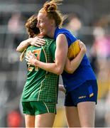 23 June 2024; Sarah Wall of Meath and Aishling Moloney of Tipperary embrace after the TG4 All-Ireland Ladies Football Senior Championship Round 3 match between Meath and Tipperary at Páirc Tailteann in Navan, Meath. Photo by Brendan Moran/Sportsfile