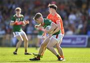 23 June 2024; Daithí Butler of Mayo in action against Eoin Duffy of Armagh during the Electric Ireland GAA Football All-Ireland Minor Championship semi-final match between Armagh and Mayo at Glennon Brothers Pearse Park in Longford. Photo by Sam Barnes/Sportsfile