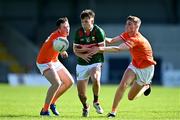 23 June 2024; Harry McHale of Mayo in action against Dáithí O'Callaghan, left, and Keelan McEntee of Armagh  during the Electric Ireland GAA Football All-Ireland Minor Championship semi-final match between Armagh and Mayo at Glennon Brothers Pearse Park in Longford. Photo by Sam Barnes/Sportsfile