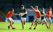 23 June 2024; Harry McHale of Mayo in action against Dáithí O'Callaghan, left, and Keelan McEntee of Armagh  during the Electric Ireland GAA Football All-Ireland Minor Championship semi-final match between Armagh and Mayo at Glennon Brothers Pearse Park in Longford. Photo by Sam Barnes/Sportsfile