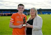 23 June 2024; Dáithí O'Callaghan of Armagh is presented with with his Player of the Match award by Maire Scully from Electric Ireland, after today's Electric Ireland All-Ireland Minor Football semi-final match between Armagh and Mayo at Glennon Brothers Pearse Park in Longford. #ThisIsMajor. Photo by Sam Barnes/Sportsfile