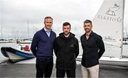 27 June 2024; Elkstone announces its sponsorship of Irish Olympic sailor Finn Lynch at Dún Laoghaire Yacht Club in Dublin. Pictured at the announcement are Irish Olympic Sailor Finn Lynch, centre, with Elkstone Head of Clients Joe Bergin, left, and Head of Staff Rob Kearney. Photo by Sam Barnes/Sportsfile