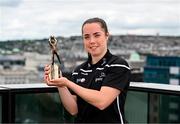 27 June 2024; PwC GPA Player of the Month for May in ladies football, Danielle O’Leary of Kerry, with her award at PwC’s office in Cork. Photo by Tyler Miller/Sportsfile