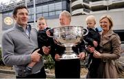 16 September 2010; RTÉ Radio commentator Mícheál Ó Muircheartaigh holds on to the Sam Maguire Cup with grandsons twins Eoghan, left, and Liam, aged 2, along with Dominic Wilkinson and daughter Neasa during a press conference to raise funds for the Cormac McAnallen Trust which go directly to screening services and the purchase of defibrillators to help combat Sudden Adult Death Syndrome. The campaign hopes to have 100,000 texts to the number 53306 in the Republic of Ireland and 81108 in Northern Ireland, by full-time in Sunday's All-Ireland Senior Football Final between Down and Cork, which will be O Muircheartaigh's final commentary at a GAA Football All-Ireland Championship Final before his retirement. Micheal O'Muircheartaigh Press Conference, Croke Park Hotel, Jones's Road, Dublin. Photo by Barry Cregg/Sportsfile