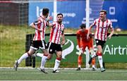 28 June 2024; Cameron Dummigan of Derry City, left, celebrates with teammates Patrick Hoban, centre, and Daniel Kelly after scoring their side's first goal during the SSE Airtricity Men's Premier Division match between Derry City and Drogheda United at The Ryan McBride Brandywell Stadium in Derry. Photo by Ben McShane/Sportsfile