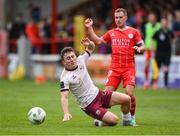 28 June 2024; Edward McCarthy of Galway United in action against Liam Burt of Shelbourne during the SSE Airtricity Men's Premier Division match between Shelbourne and Galway United at Tolka Park in Dublin. Photo by Stephen McCarthy/Sportsfile