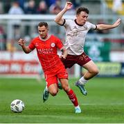 28 June 2024; Liam Burt of Shelbourne in action against Edward McCarthy of Galway United during the SSE Airtricity Men's Premier Division match between Shelbourne and Galway United at Tolka Park in Dublin. Photo by Thomas Flinkow/Sportsfile