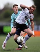 28 June 2024; John Mountney of Dundalk in action against Ben McCormack of Waterford during the SSE Airtricity Men's Premier Division match between Dundalk and Waterford at Oriel Park in Dundalk, Louth. Photo by Shauna Clinton/Sportsfile