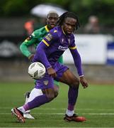 28 June 2024; Thomas Oluwa of Wexford in action against Kevin Williams of Kerry FC during the SSE Airtricity Men's First Division match between Kerry FC and Wexford at Mounthawk Park in Tralee, Kerry. Photo by Brendan Moran/Sportsfile