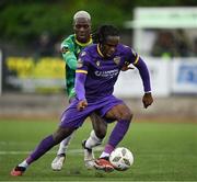 28 June 2024; Thomas Oluwa of Wexford in action against Kevin Williams of Kerry FC during the SSE Airtricity Men's First Division match between Kerry FC and Wexford at Mounthawk Park in Tralee, Kerry. Photo by Brendan Moran/Sportsfile