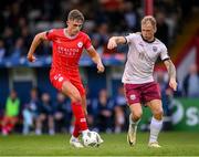 28 June 2024; Evan Caffrey of Shelbourne and Stephen Walsh of Galway United during the SSE Airtricity Men's Premier Division match between Shelbourne and Galway United at Tolka Park in Dublin. Photo by Stephen McCarthy/Sportsfile