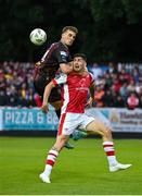 28 June 2024; Cian Kavanagh of St Patrick's Athletic in action against Cian Byrne of Bohemians during the SSE Airtricity Men's Premier Division match between St Patrick's Athletic and Bohemians at Richmond Park in Dublin. Photo by Seb Daly/Sportsfile