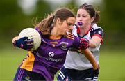 29 June 2024; Aoife Donovan of Kilmacud Crokes in action against Hazel McGourty of New York during the John West Féile Peile na nÓg Division One Finals 2024 at the Connacht GAA Centre of Excellence in Bekan, Mayo. Photo by Ben McShane/Sportsfile