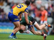 29 June 2024; Armagh goalkeeper Blaine Hughes in action against Donie Smith of Roscommon during the GAA Football All-Ireland Senior Championship quarter-final match between Armagh and Roscommon at Croke Park in Dublin. Photo by Stephen McCarthy/Sportsfile