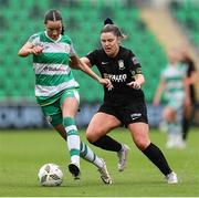 29 June 2024; Aoife Kelly of Shamrock Rovers in action against Laurie Ryan of Athlone Town during the SSE Airtricity Women's Premier Division match between Shamrock Rovers and Athlone Town at Tallaght Stadium in Dublin. Photo by Thomas Flinkow/Sportsfile