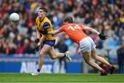 29 June 2024; Daire Cregg of Roscommon is tackled by Andrew Murnin of Armagh during the GAA Football All-Ireland Senior Championship quarter-final match between Armagh and Roscommon at Croke Park in Dublin. Photo by Stephen McCarthy/Sportsfile