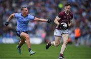 29 June 2024; Cein Darcy of Galway is tackled by Ciaran Kilkenny of Dublin during the GAA Football All-Ireland Senior Championship quarter-final match between Dublin and Galway at Croke Park in Dublin. Photo by Shauna Clinton/Sportsfile