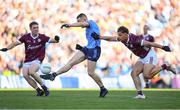 29 June 2024; Con O'Callaghan of Dublin shoots to score a point despite the efforts of Seán Fitzgerald of Galway during the GAA Football All-Ireland Senior Championship quarter-final match between Dublin and Galway at Croke Park in Dublin. Photo by Shauna Clinton/Sportsfile