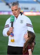 29 June 2024; Galway manager Pádraic Joyce is joined by his daughter Jodie during his post-match GAAGO interview following the GAA Football All-Ireland Senior Championship quarter-final match between Dublin and Galway at Croke Park in Dublin. Photo by Stephen McCarthy/Sportsfile