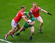 30 June 2024; Patrick McBrearty of Donegal in action against Anthony Williams, left, and Donal McKenny of Louth during the GAA Football All-Ireland Senior Championship quarter-final match between Donegal and Louth at Croke Park in Dublin. Photo by Piaras Ó Mídheach/Sportsfile