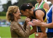 30 June 2024; Sophie O'Sullivan of Ballymore Cobh AC, Cork, is presented with her women's 1500m gold medal by her mother, Olympian Sonia O'Sullivan during day two of the 123.ie National Outdoor Senior Championships at Morton Stadium in Santry, Dublin. Photo by Sam Barnes/Sportsfile